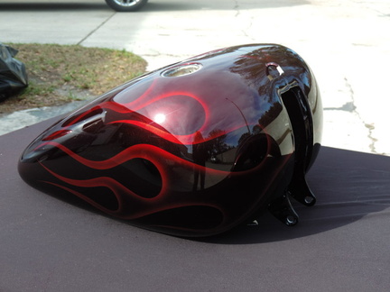 Candy Wineberry custom paint job with flames on a Road Glide using